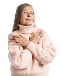 Photo of Senior woman wearing different rings on white background