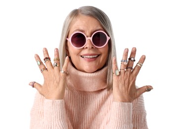Photo of Senior woman wearing different rings on white background