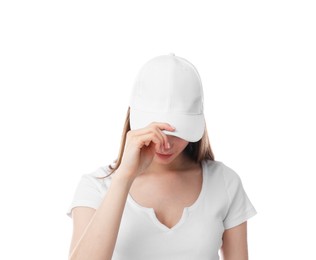 Photo of Young woman wearing stylish baseball hat on white background