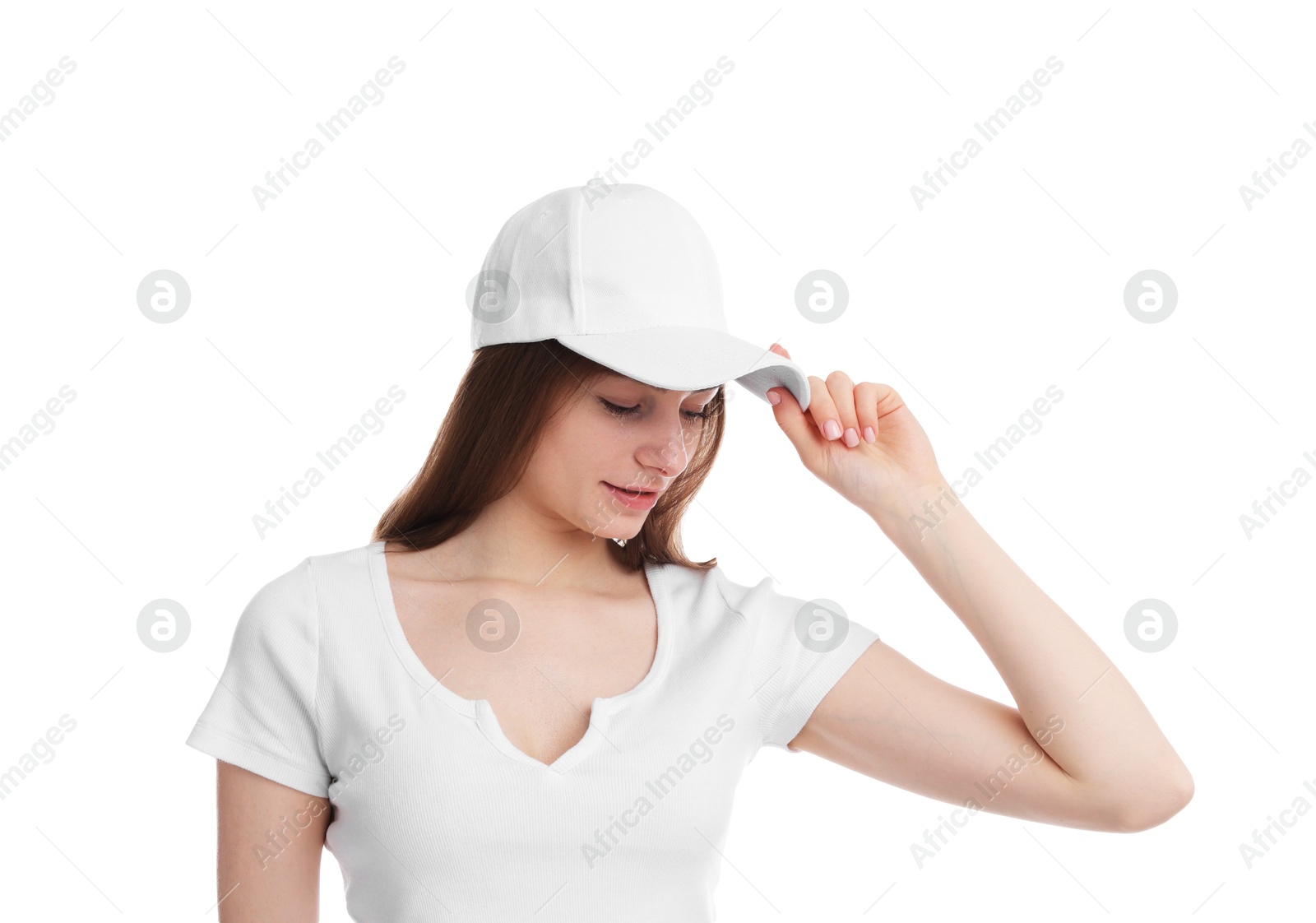 Photo of Young woman wearing stylish baseball hat on white background