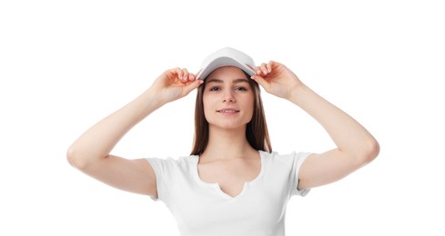 Photo of Young woman wearing stylish baseball hat on white background