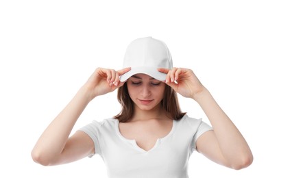 Photo of Young woman wearing stylish baseball hat on white background
