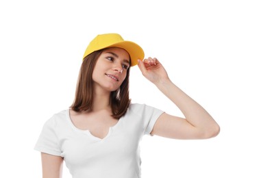 Photo of Young woman wearing stylish yellow baseball hat on white background