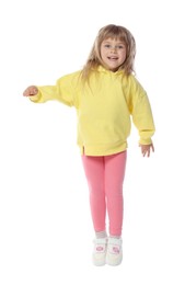 Photo of Happy little girl dancing on white background