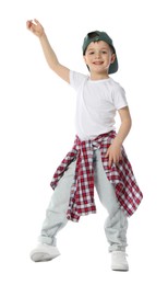Photo of Happy little boy in baseball hat dancing on white background