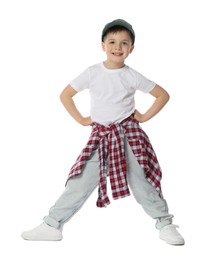 Photo of Happy little boy in baseball hat dancing on white background