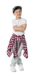 Photo of Happy little boy in baseball hat dancing on white background
