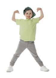 Photo of Happy little boy in baseball hat dancing on white background
