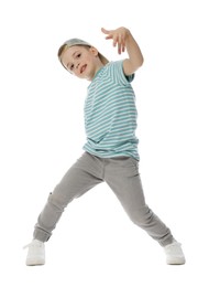 Photo of Happy little boy in baseball hat dancing on white background