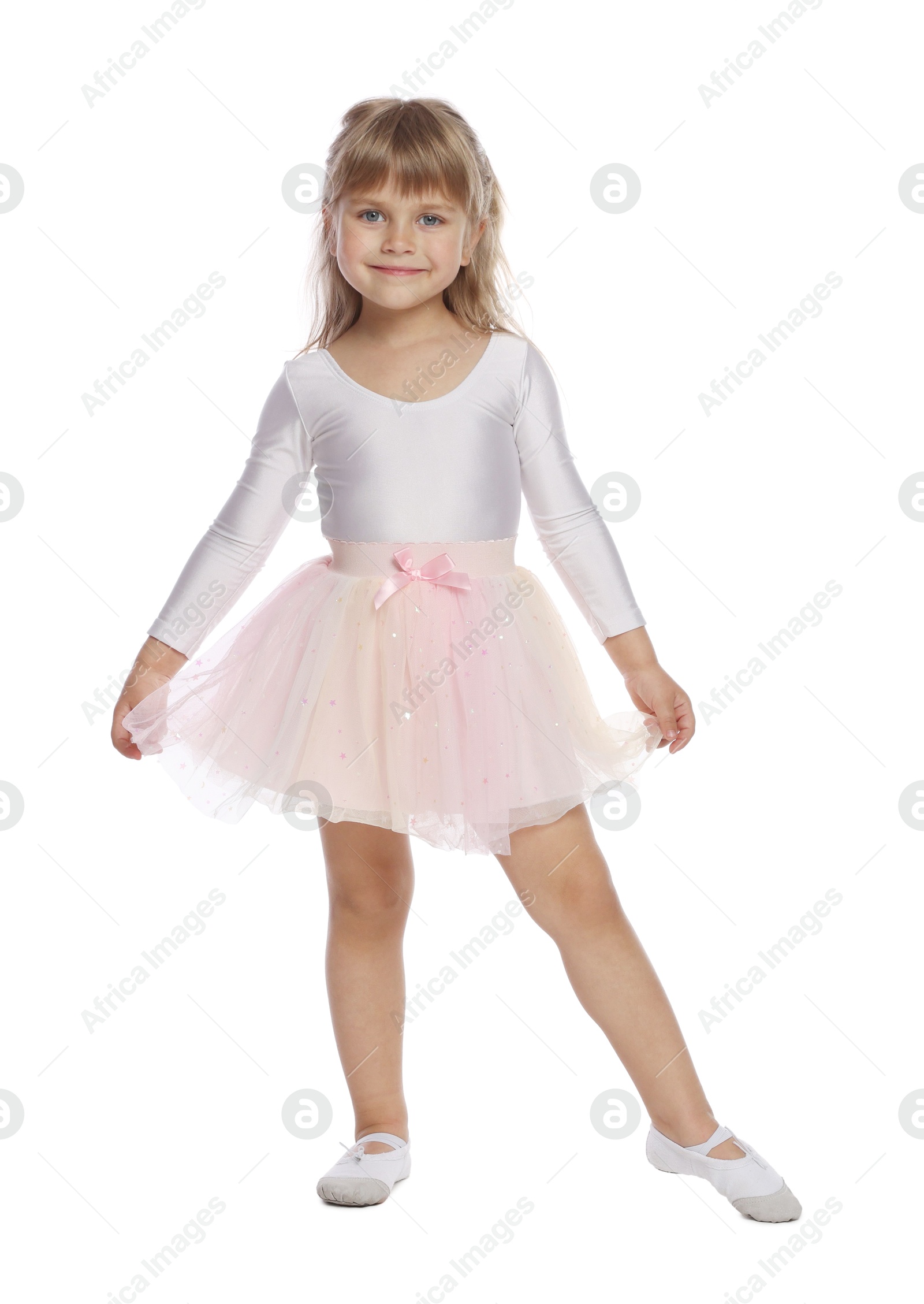 Photo of Cute little dancer in tutu skirt on white background