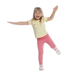 Photo of Happy little girl dancing on white background
