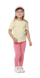 Photo of Cute little girl in baseball hat dancing on white background