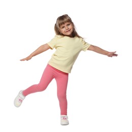 Photo of Cute little girl dancing on white background