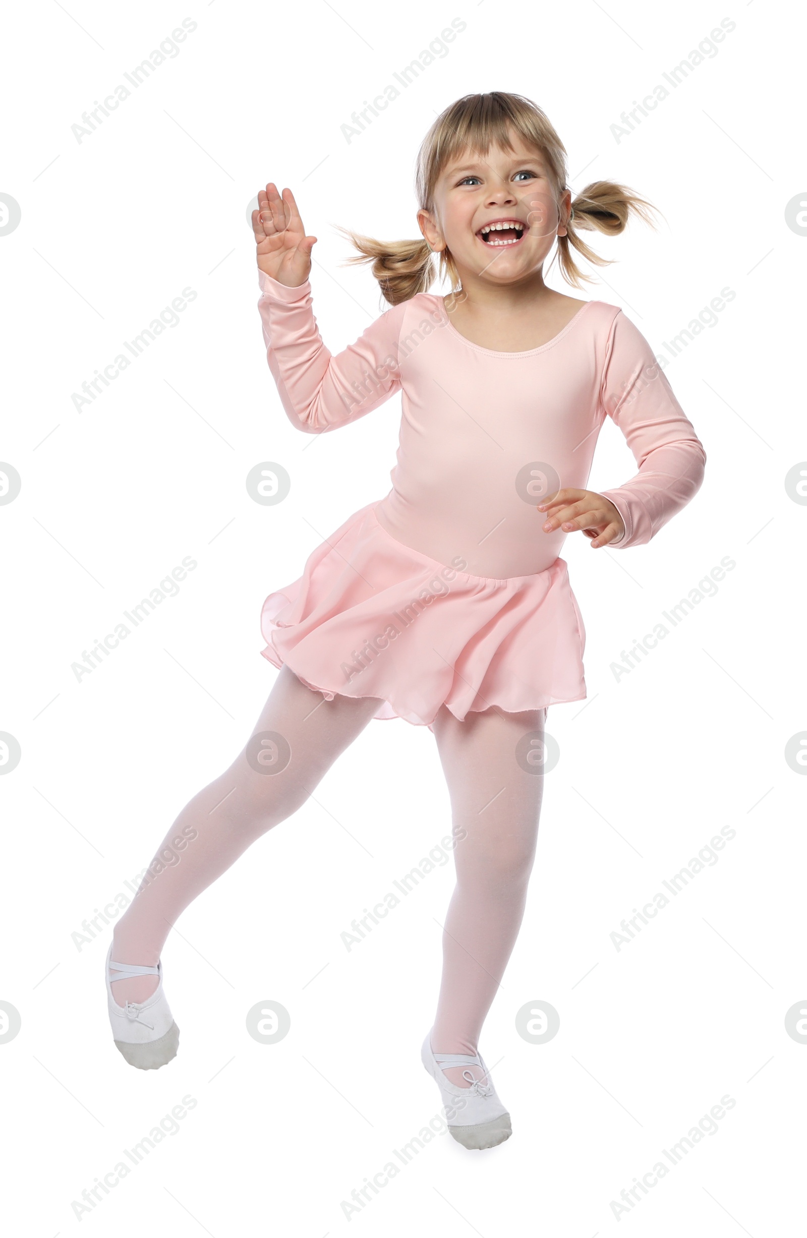 Cute little girl dancing on white background Photo of Cute little girl dancing on white background