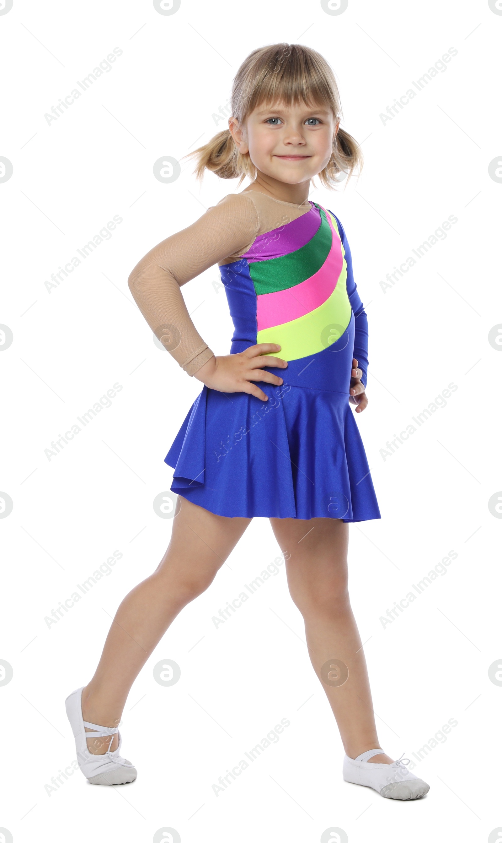 Cute little girl dancing on white background Photo of Cute little girl dancing on white background