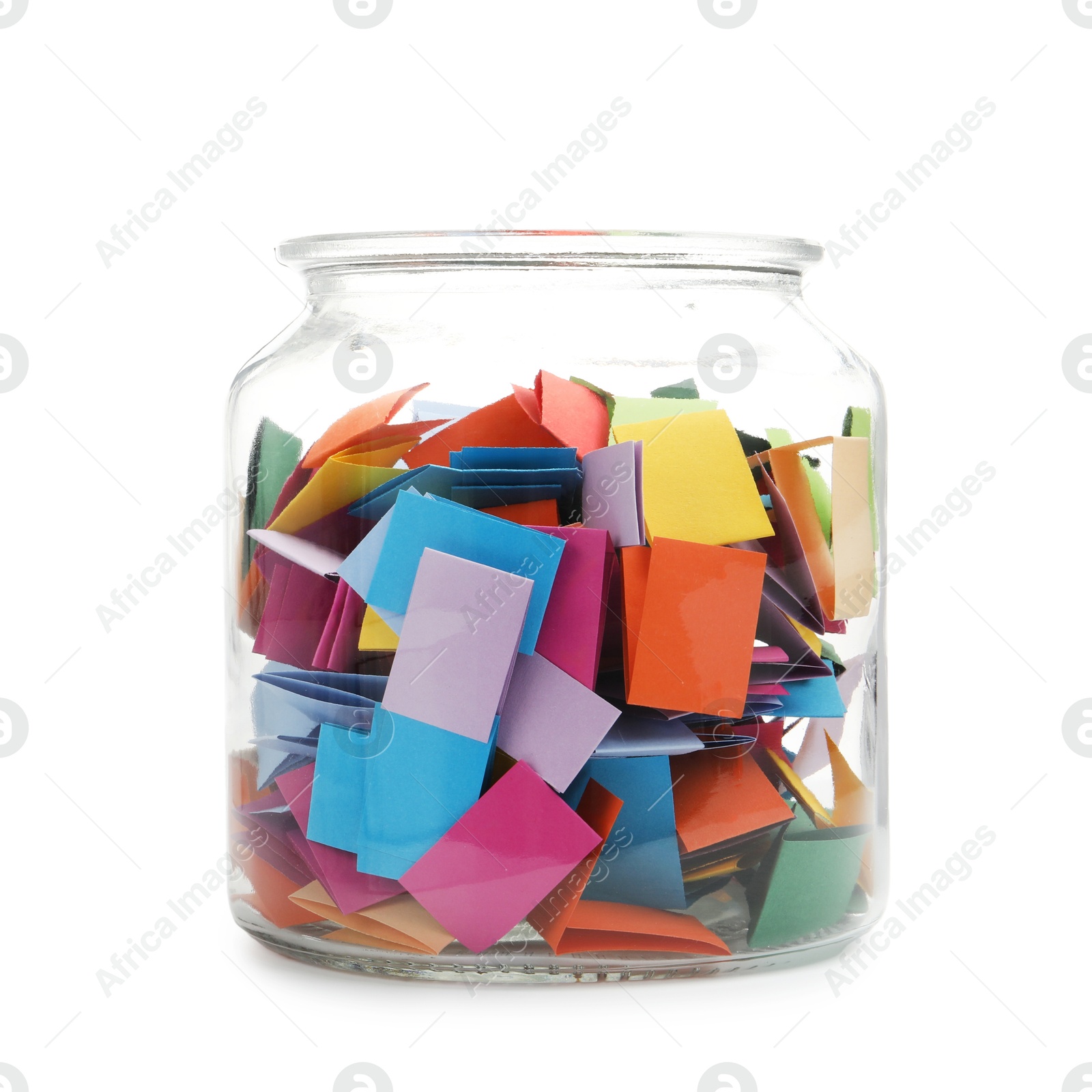 Colorful paper pieces in glass jar isolated on white Photo of Colorful paper pieces in glass jar isolated on white