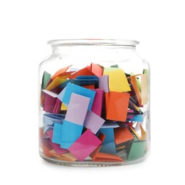 Photo of Colorful paper pieces in glass jar isolated on white