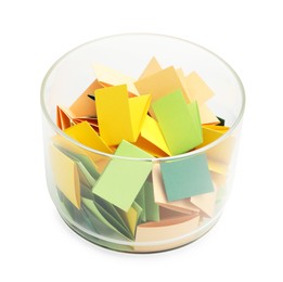 Photo of Colorful paper pieces in glass jar isolated on white