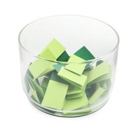 Photo of Colorful paper pieces in glass jar isolated on white