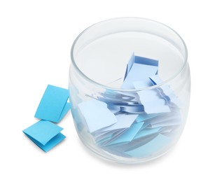 Photo of Colorful paper pieces in glass jar isolated on white