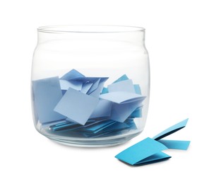 Photo of Colorful paper pieces in glass jar isolated on white