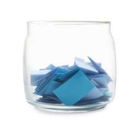 Photo of Colorful paper pieces in glass jar isolated on white
