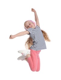 Photo of Cute little girl dancing on white background