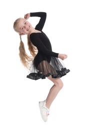 Photo of Cute little girl dancing on white background