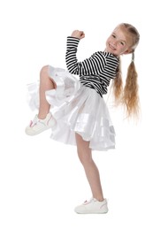 Photo of Cute little girl dancing on white background