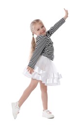 Photo of Cute little girl dancing on white background