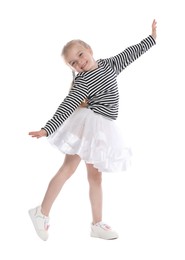Photo of Cute little girl dancing on white background