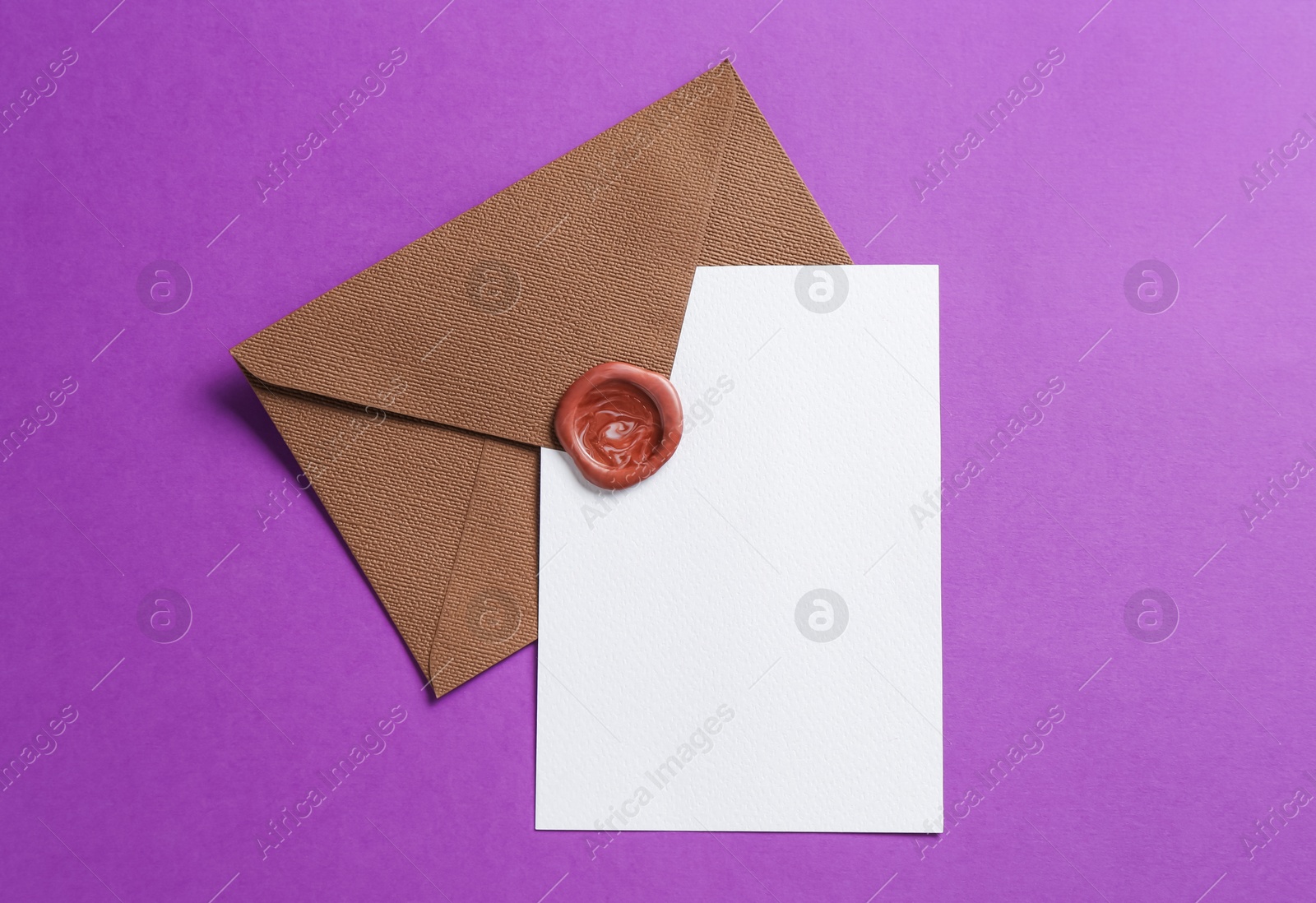 Blank invitation card and envelope on purple background, top view. Space for design Photo of Blank invitation card and envelope on purple background, top view. Space for design