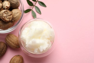 Photo of Natural shea butter on pink background, flat lay. Space for text