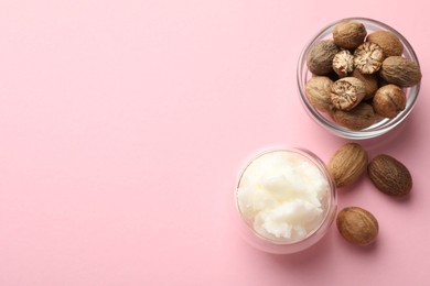 Photo of Natural shea butter on pink background, flat lay. Space for text