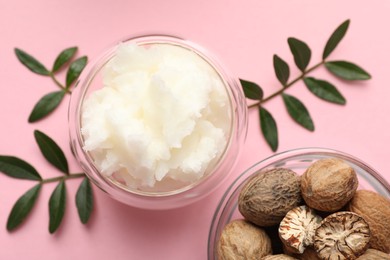 Photo of Natural shea butter on pink background, flat lay