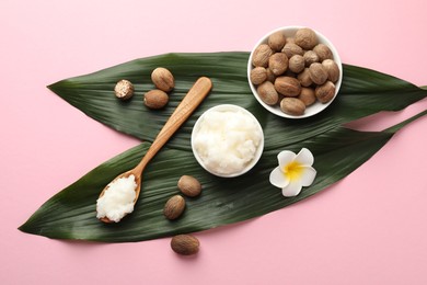 Photo of Natural shea butter on pink background, flat lay