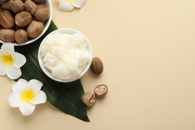Photo of Natural shea butter on beige background, flat lay. Space for text