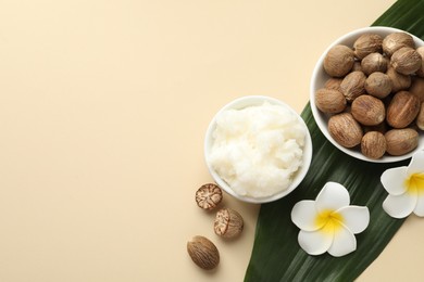 Photo of Natural shea butter on beige background, flat lay. Space for text