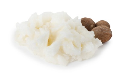 Photo of Shea butter and nuts isolated on white