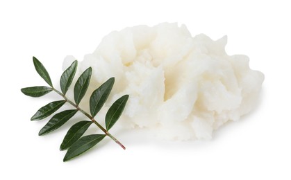 Photo of Shea butter and leaves isolated on white
