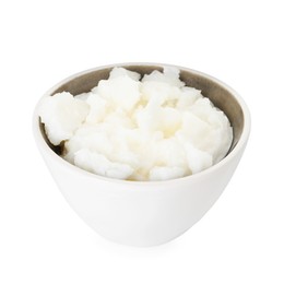 Photo of Shea butter in bowl isolated on white