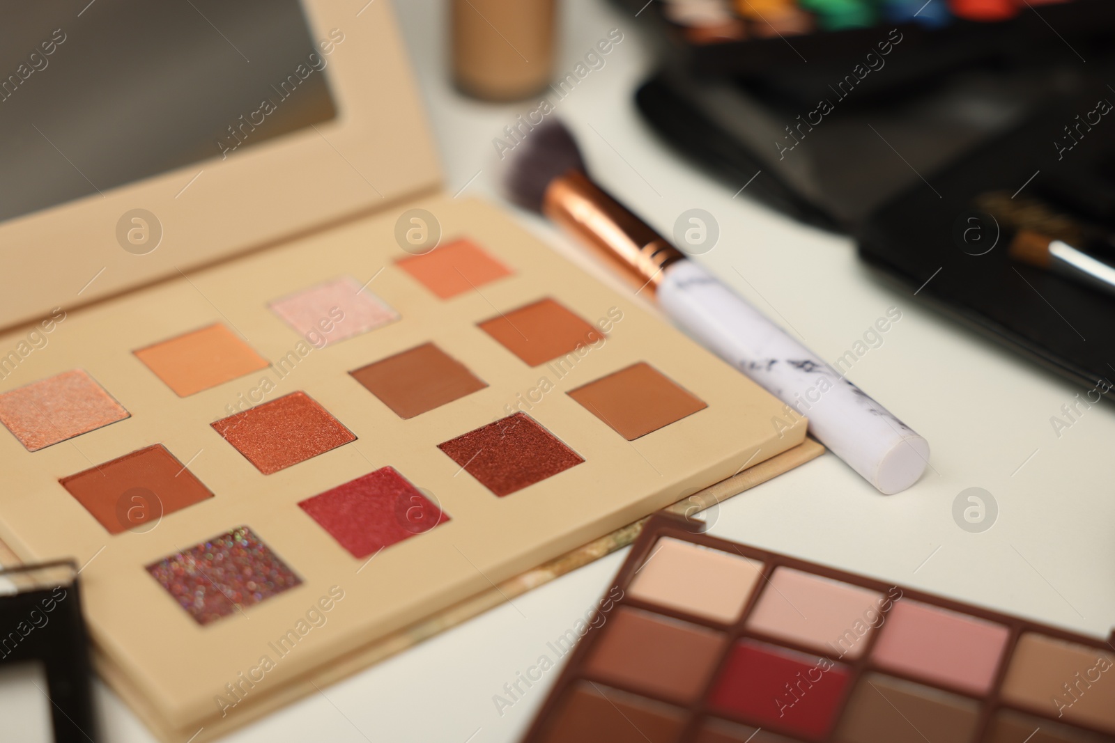 Different makeup products on dressing table, closeup Photo of Different makeup products on dressing table, closeup