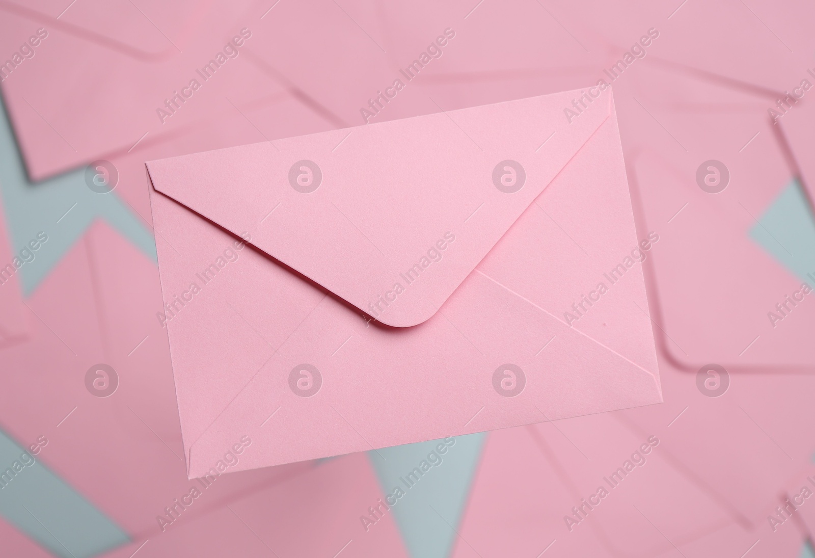 Beautiful invitation envelope on glass surface, top view Photo of Beautiful invitation envelope on glass surface, top view