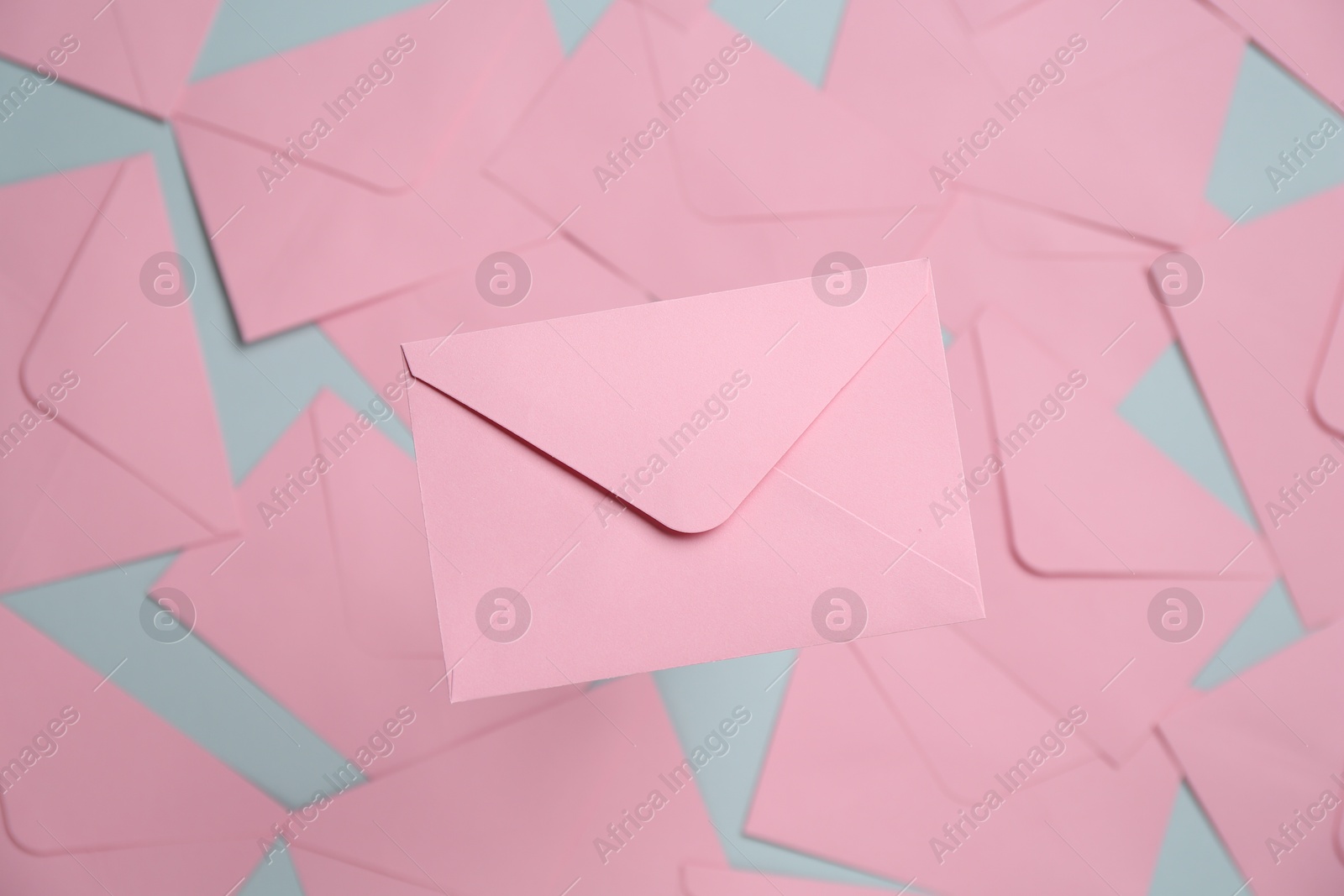 Beautiful invitation envelope on glass surface, top view Photo of Beautiful invitation envelope on glass surface, top view