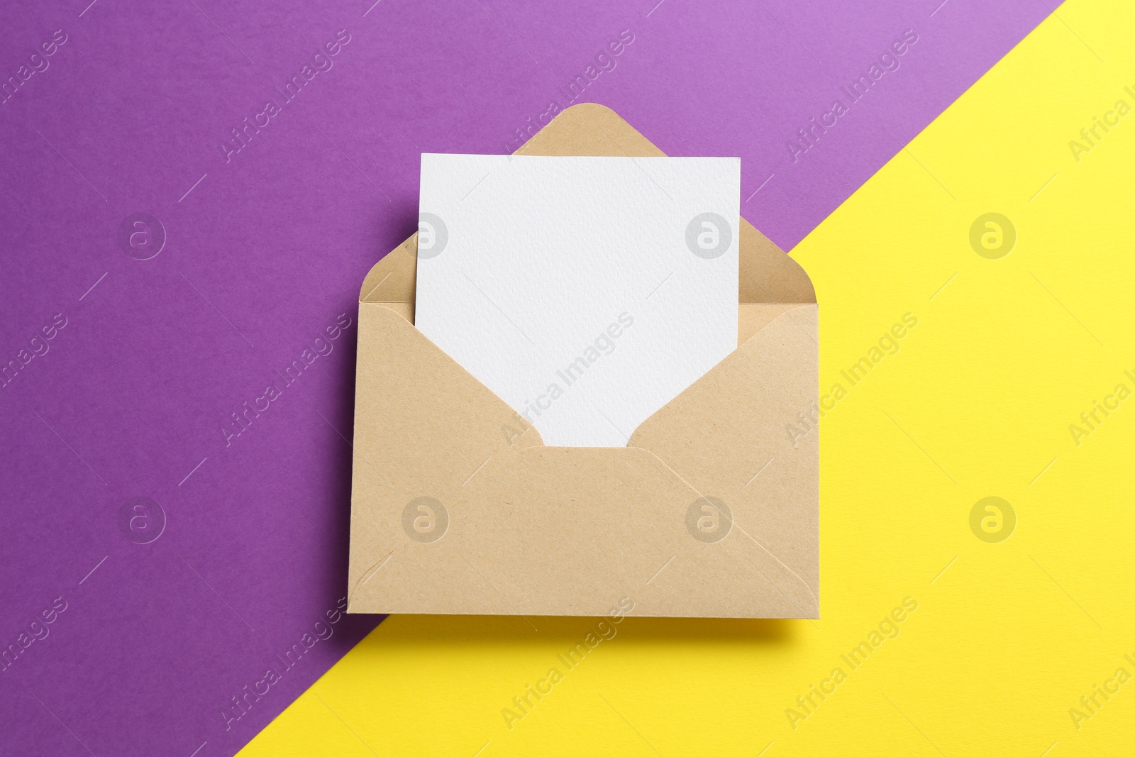 Blank invitation card and envelope on color background, top view. Space for design Photo of Blank invitation card and envelope on color background, top view. Space for design