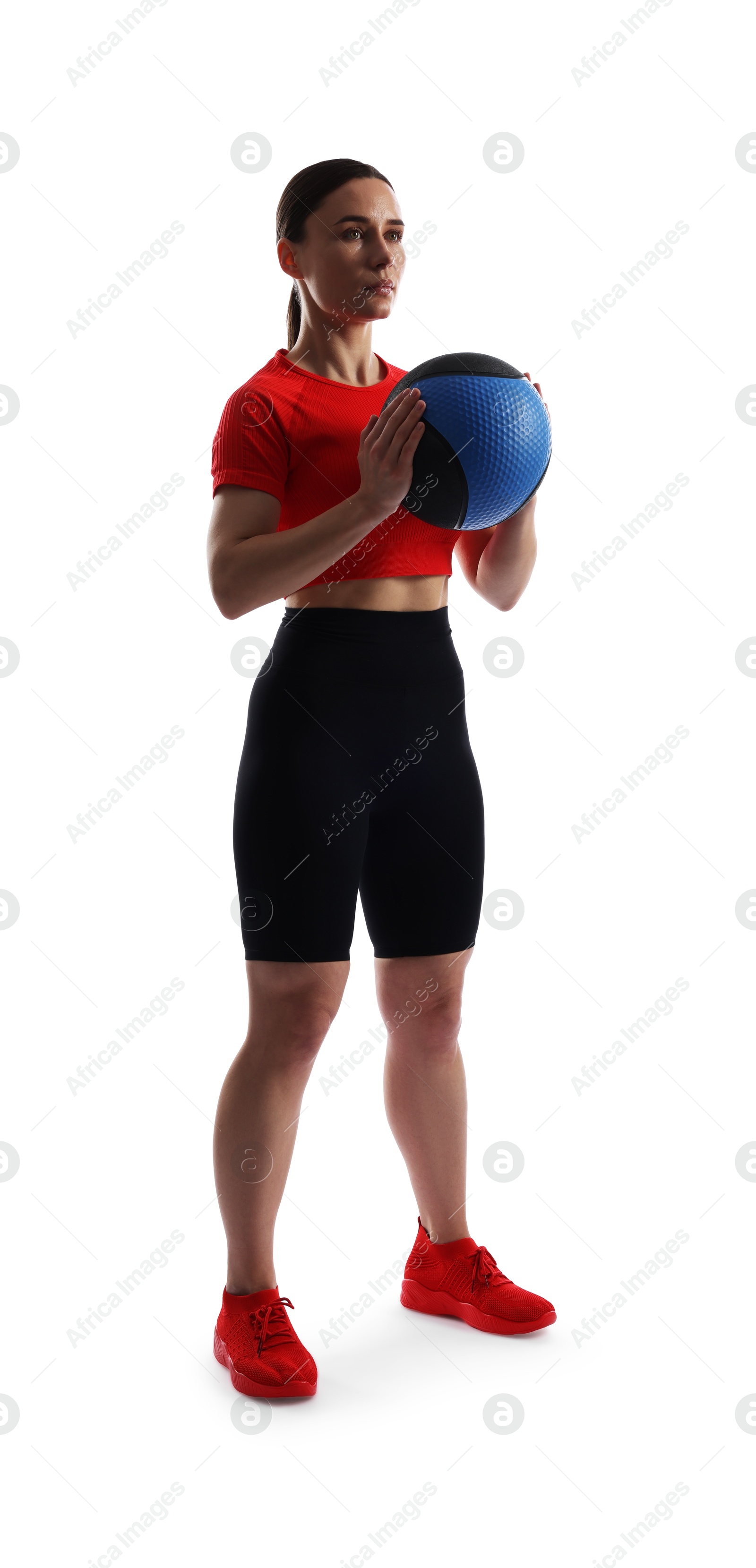 Woman with medicine ball on white background Photo of Woman with medicine ball on white background