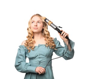 Photo of Woman curling her hair on white background