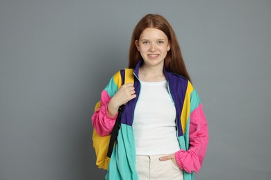 Photo of Portrait of teenage girl on grey background