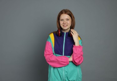 Photo of Portrait of teenage girl on grey background