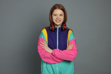 Photo of Portrait of teenage girl on grey background